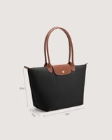 شنطة نسائية بمقاس كبير بلون أسود وبني