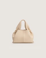 شنطة أمجاد النسائية جلد باللون البيج