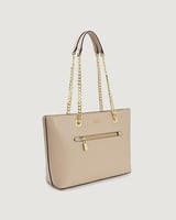شنطة نسائية كلاسيك بلون بيج.
