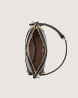 شنطة نسائية بتصميم أنيق بلون أسود