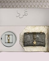 هدية نسائية ساعة وشنطة بتصميم ملفت