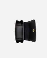 شنطة نسائية من الجلد بلون أسود تتزين بتطريز ملون