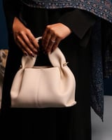 شنطة أمجاد النسائية جلد باللون البيج