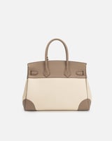 شنطة نسائية واسعة بلون بني فاتح وبيج