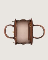 شنطة بلون بني بحجم كبير لكل الأوقات