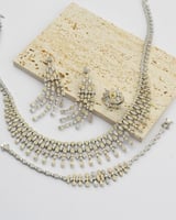 طقم نسائي زركون جذاب بلون فضي وذهبي