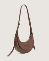 شنطة بمقاس واسع باللون البني