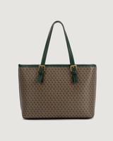 شنطة نسائية بتصميم عملي بلون أخضر.