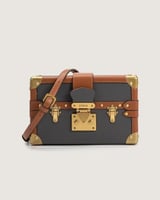 شنطة جوهرة النسائية بلون رمادي وبني.