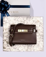 شنطة نسائية بحجم صغير من الجلد بلون بني