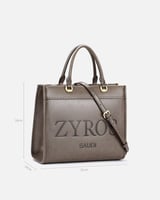 شنطة نسائيه بتصميم متفرد بلون رمادي