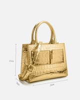 ‎ شنطة نسائية للمناسبات بلون ذهبي