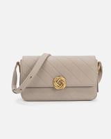 شنطة نسائية بتصميم أنيق بلون بيج