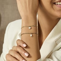 اسوره نسائيه بتصميم ناعم بلون ذهبي