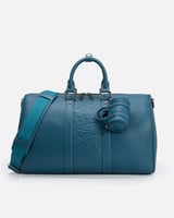 شنطة للجنسين بتصميم أنيق بلون أزرق