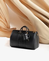 شنطة للجنسين بتصميم أنيق بلون أسود