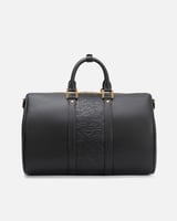 شنطة للجنسين بتصميم أنيق بلون أسود