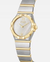 ساعة ألماس نسائية ستيل بلون فضي وذهبي