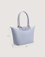 شنطة نسائية بمقاس كبير بلون أزرق