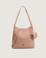 شنطة نسائية بتصميم مميز بلون وردي