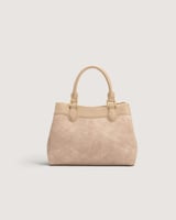 شنطة نسائية من الجلد بلون وردي