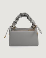 شنطة نسائية بتصميم مميز بلون رمادي