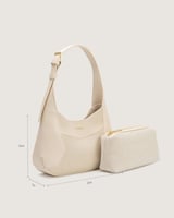 شنطة نسائية تناسب كل يوم بلون أبيض