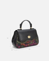 شنطة نسائية من الجلد بلون أسود تتزين بتطريز ملون