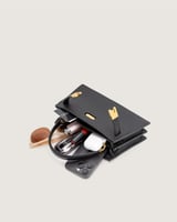 شنطة دفء النسائية جلد بلون أسود