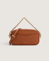 ‎ شنطة نسائية أنيقة بلون بني