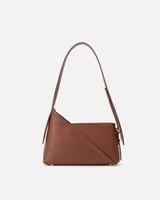 شنطة كتحفة هندسية بلون بني