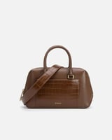 شنطة نسائية لإطلالتك اليومية باللون البني.