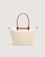 شنطة نسائية بمقاس كبير بلون بيج وبني