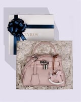 شنطة نسائية لإطلالتك العملية بلون وردي