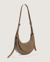 شنطة بمقاس واسع باللون البني