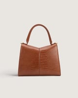 شنطة نسائية متوسطة الحجم بلون بني