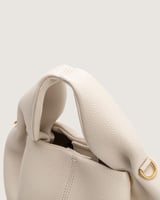 شنطة أمجاد النسائية جلد باللون البيج