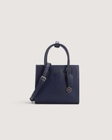 ‎ شنطة نسائية من الجلد باللون الأزرق