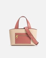 شنطة نسائية من الجلد مميزة بلون وردي