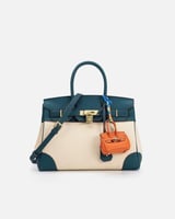 شنطة نسائية واسعة بلون أزرق وبيج