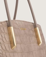 شنطة مزايا النسائية باللون البيج