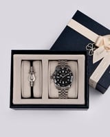 طقم رجالي من ساعة واسوارة باللون الفضي والأسود