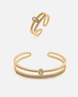 طقم نسائي راقي اسوارة وخاتم بلون ذهبي