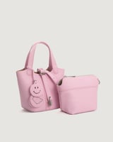 شنطة نسائية لكل يوم باللون الوردي