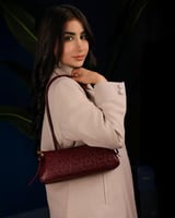 شنطة تعزز هويتك باللون العودي