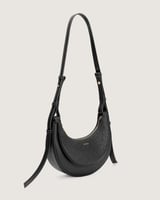 شنطة بمقاس واسع باللون الأسود