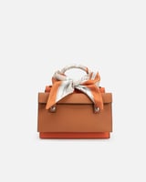 شنطة نسائية مميزة من الجلد بلون برتقالي