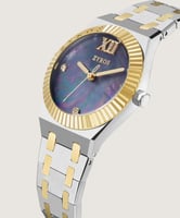 ساعة فاتن النسائية ستيل بلون ذهبي وفضي