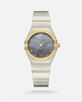 ساعة نسائية مع 4 فصوص ألماس بلون فضي وذهبي