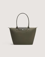 شنطة نسائية بمقاس كبير بلون أخضر